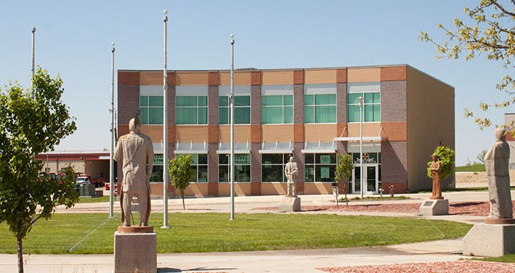 Woodlands building with statues